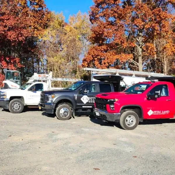 Capital Land Companies crew installing a Unilock paver patio in Guilderland NY