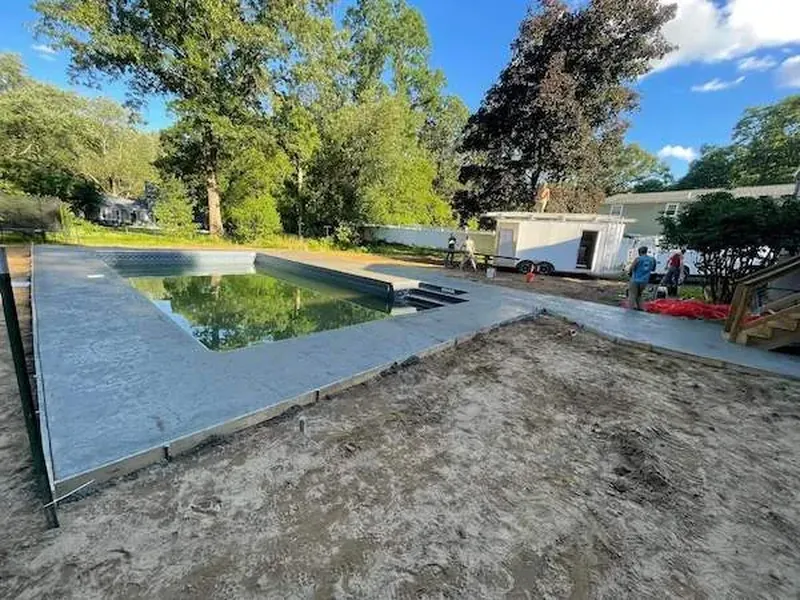Fiberglass pool installation with hardscape Clifton Park NY